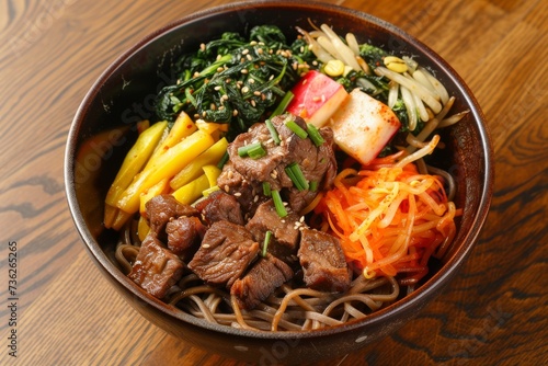 Asian food top view of beef and vegetable soba noodles