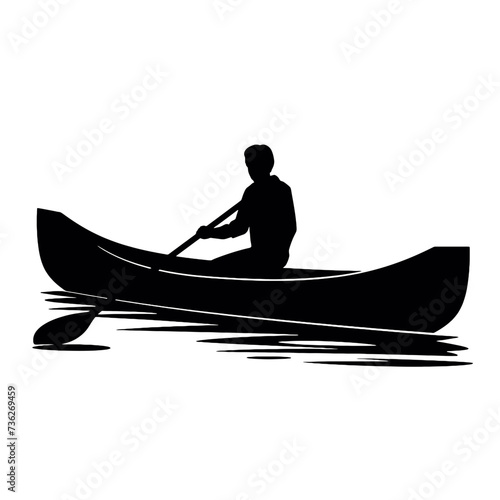 silhouette of a person in a canoe