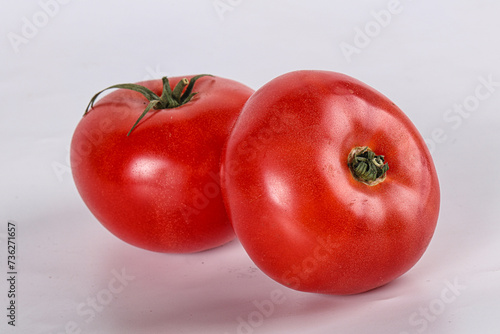 Two ripe sweet organic tomato © Andrei Starostin