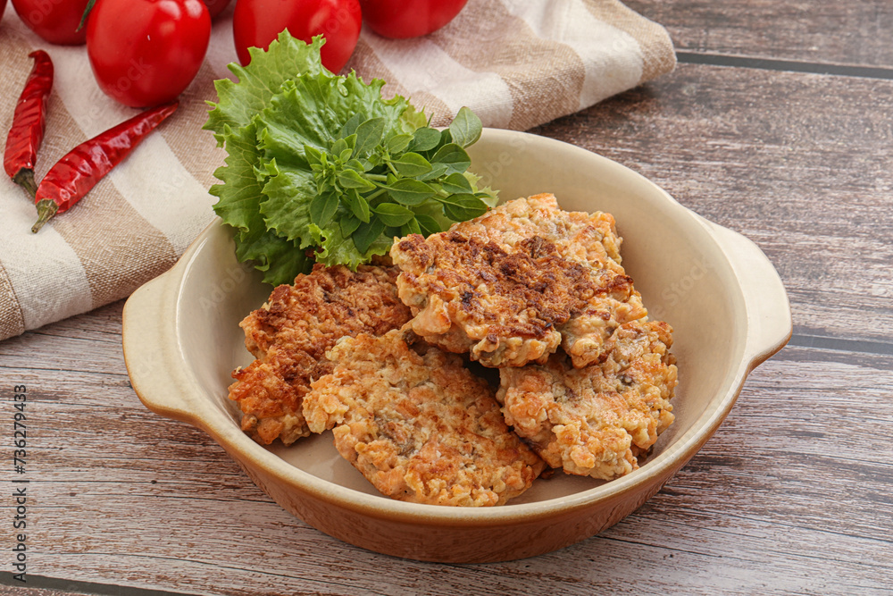 Fried salmonn cutlet in the bowl Fried salmonn cutlet in the bowl