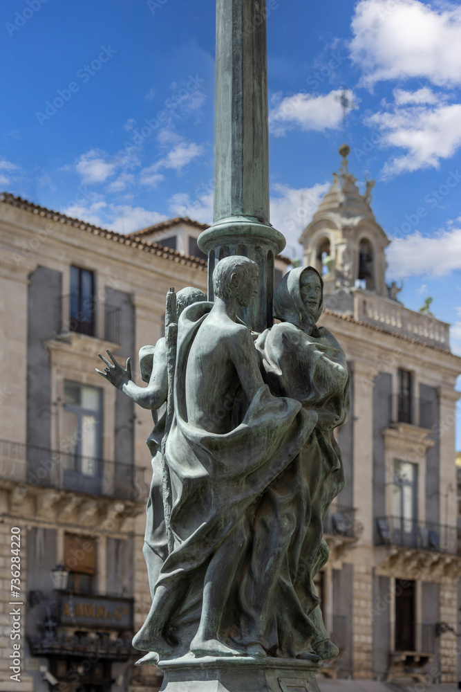 Statues of Fratelle Pii on a street lamp on University Square, Catania, Sicily, Italy Statues of Fratelle Pii on a street lamp on University Square, Catania, Sicily, Italy