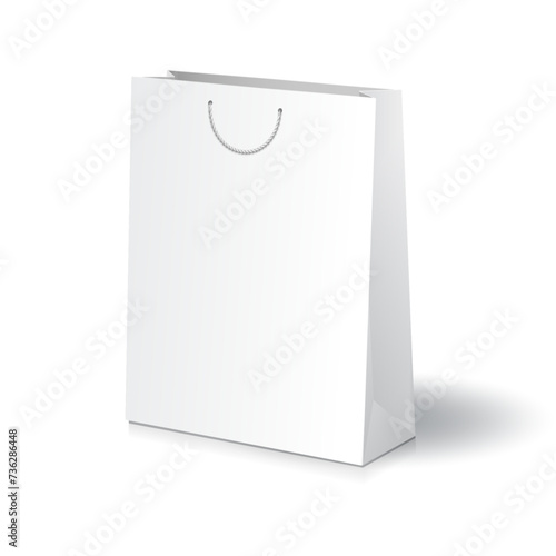 Paper shopping bag mockup. Blank white paper shopping bag or gift bag with white rope handles mockup template. Isolated on white background. Ready to use for branding design. Vector illustration. photo