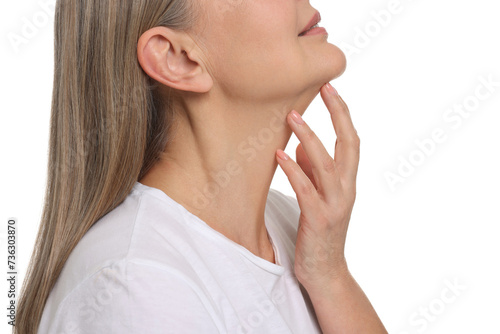 Mature woman touching her neck on white background  closeup