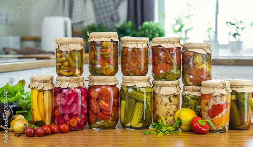 Preserving vegetables in jars in the kitchen. Selective focus.