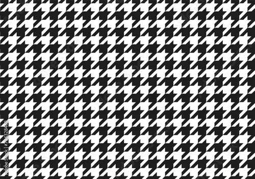 Pepita seamless pattern. Repeating pepito texture. Black houndstooth on white background.  Black and white houndstooth vector pattern.