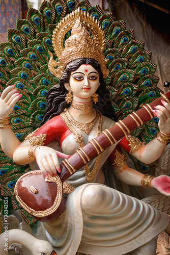 Idol of Goddess Devi Saraswati is in preparation for the upcoming Saraswati Puja at a pottery studio in Kolkata, West Bengal, India. photo