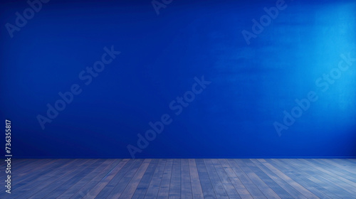 A clear cobalt blue wall, creating a bold and vibrant focal point in an empty room.