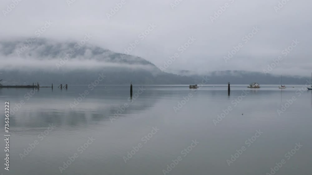 Panning left to right along the beautiful moody Cowichan Bay during a winter season on Vancouver Island in British Columbia, Canada Panning left to right along the beautiful moody Cowichan Bay during a winter season on Vancouver Island in British Columbia, Canada