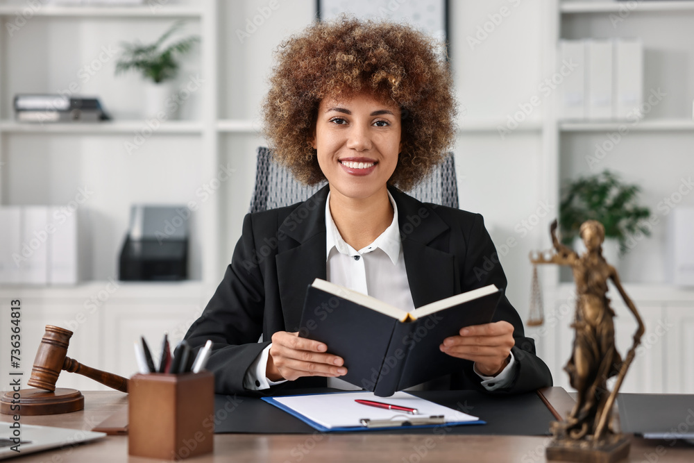 Notary with notebook at workplace in office Notary with notebook at workplace in office