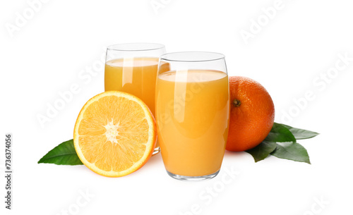 Orange juice  fresh fruits and green leaves on white background