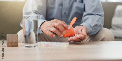 Hands, elderly person and pills on table with water, medicine for health and treatment for sick patient at home. Pharmaceutical drugs, supplements or antibiotics with daily routine for healthcare