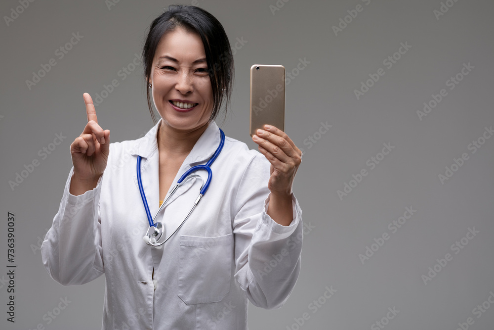 Medical professional enthusiastic about smartphone app feature
