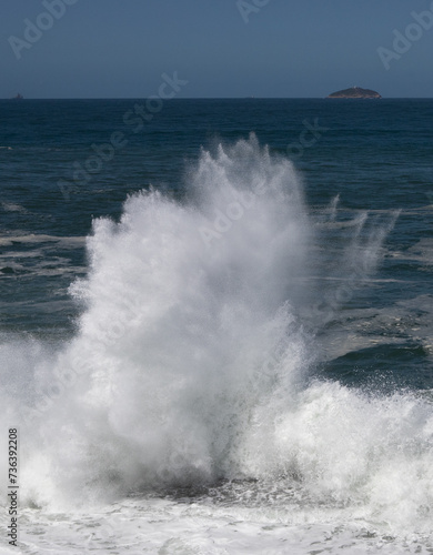 Big waves caused by the undertow crashing against the rocks at Rio de Janeiro  Brazil