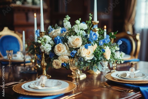 A table adorned with blue and white flowers and candles creates an elegant and inviting atmosphere, An elegant royal blue and gold wedding, AI Generated