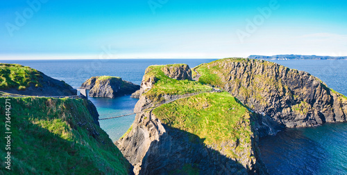 Typical Irish landscape with suspended bridge on cliffs (Northern Ireland - United Kingdom - Carrick a Rede)