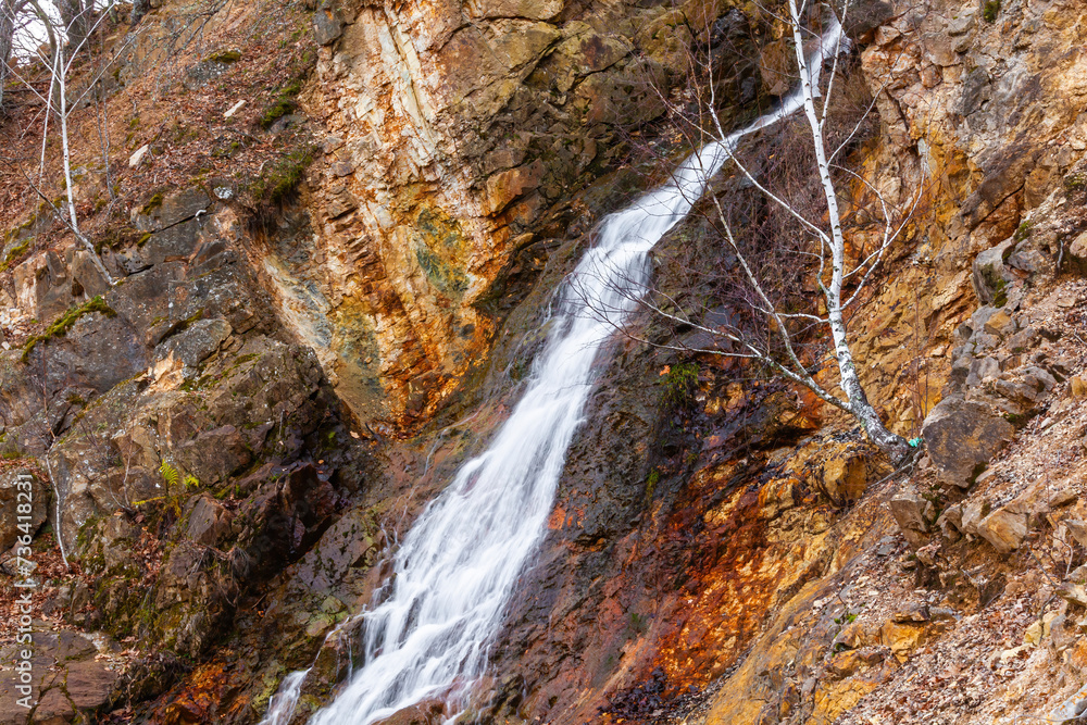 Obraz premium Scenic waterfall in slow motion flow
