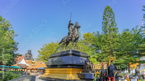 Picture of King Taksin the Great Monument. or King Krung Thonburi riding a horse and held the sword in his hand to proclaim victory. In Huai Mongkol Temple Prachuap Khiri Khan Province photo