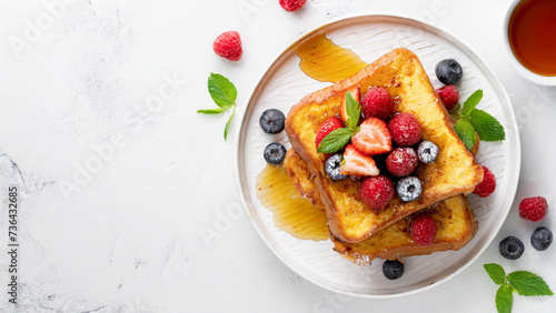Obraz na płótnie French toast with fresh berries and syrup on white background, panoramic shot with copy space w salonie