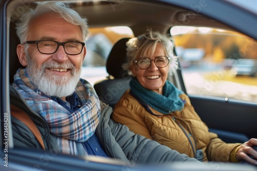 A happy couple enjoys a scenic drive together, their beaming smiles reflected in the car's windows as they take in the beautiful outdoor landscape