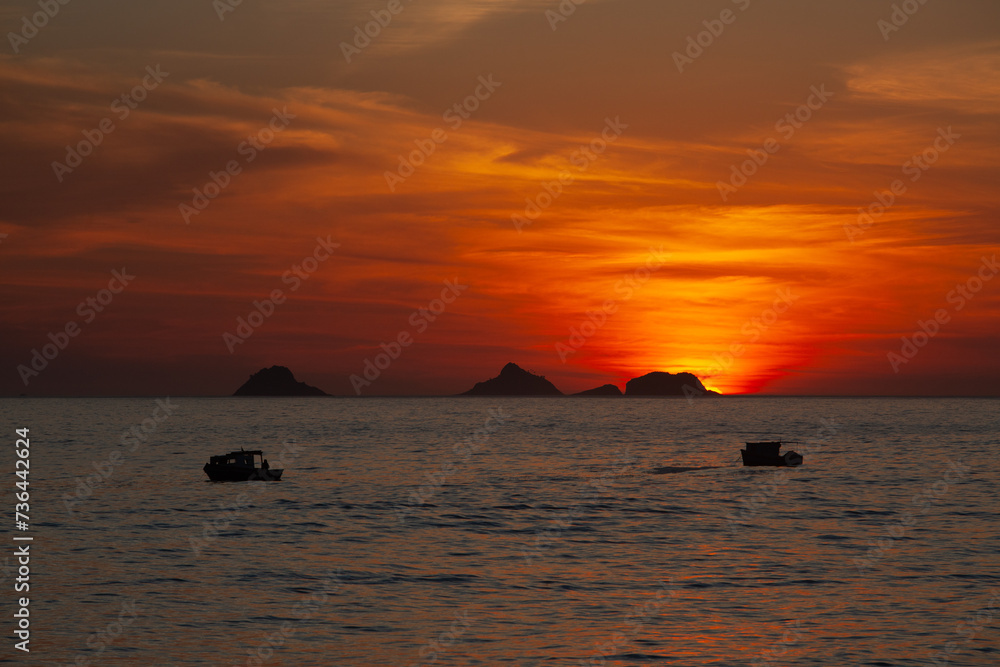 Fishing boat at sunset