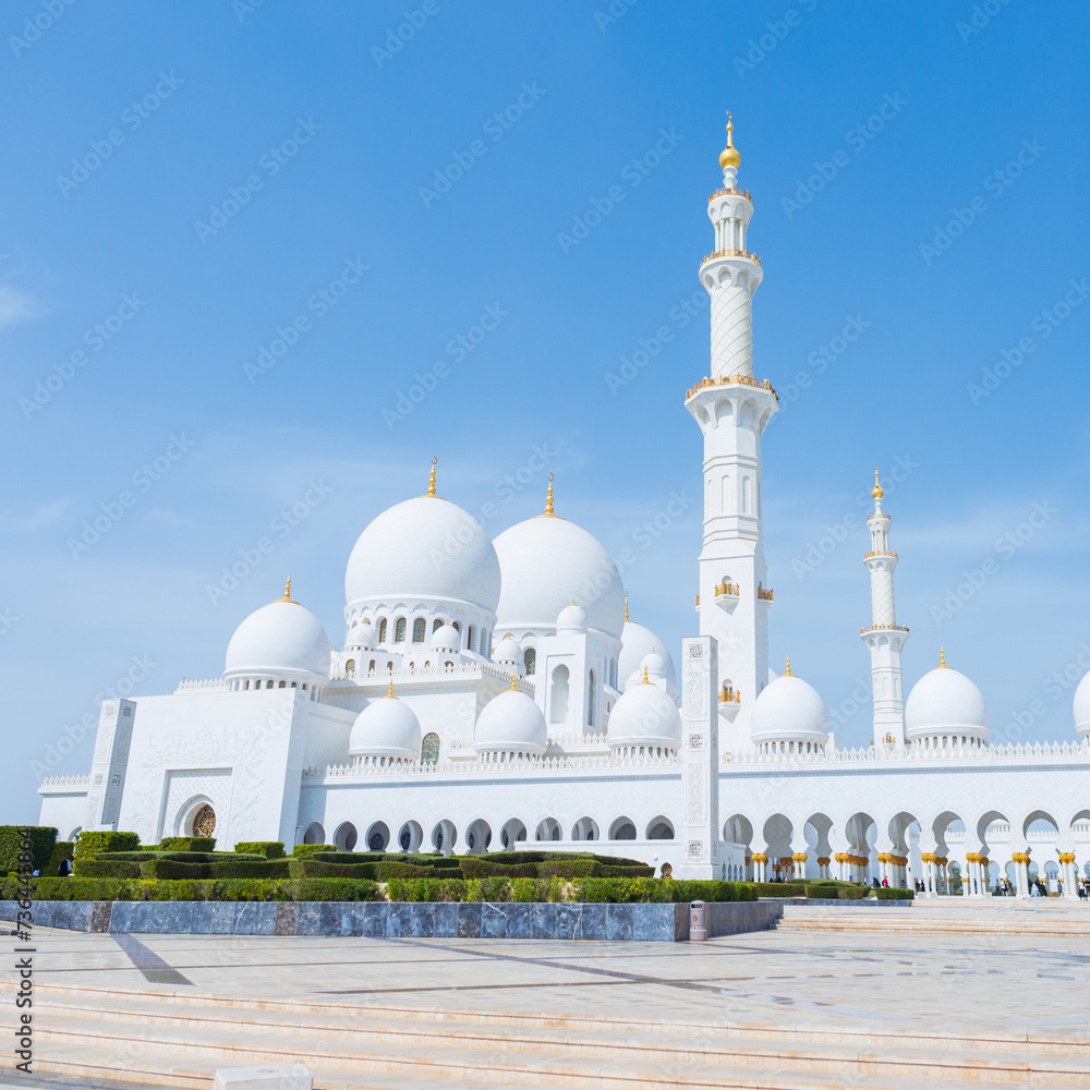 Amazing beautiful white mosque on a sunny day. Sheikh Zayed Grand Mosque Centre