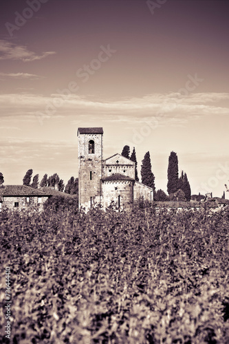 Ancient italian Romanesque church in the Tuscany countryside nea photo