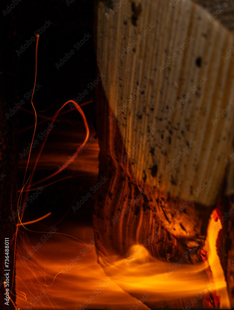 Burning logs in a home stove