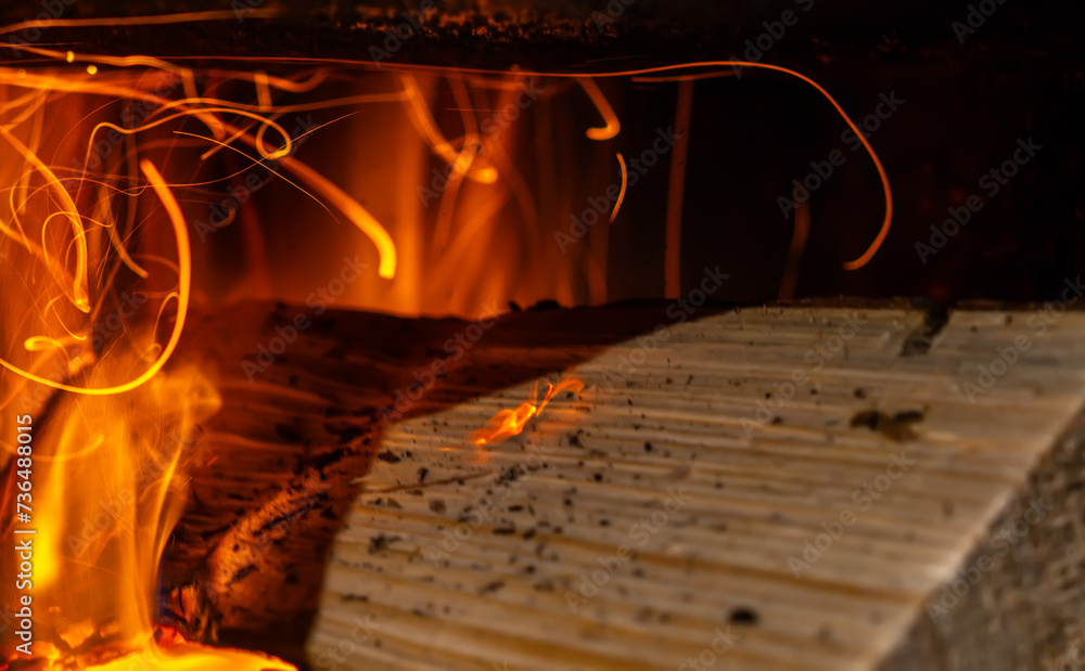 Part of a log engulfed in fire