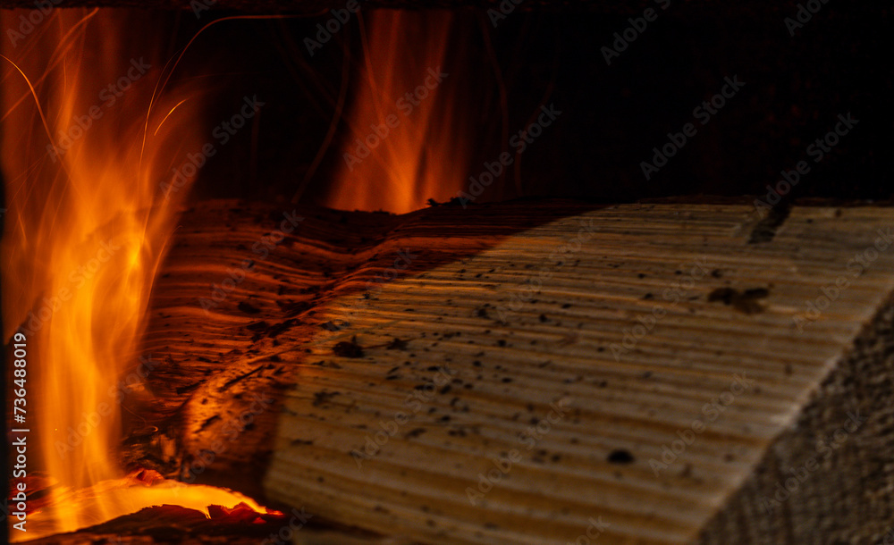 Flame from a burning log
