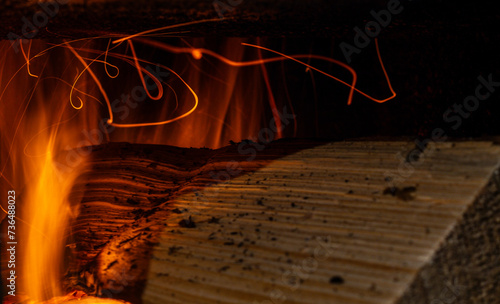 Obraz na płótnie Trajectory of burning log particles w salonie