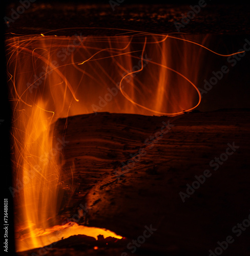 Obraz na płótnie The process of burning part of a log in a stove w salonie