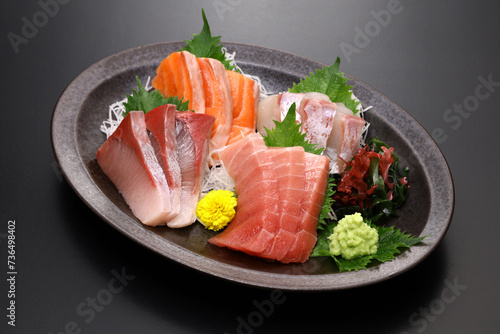assorted sashimi; tuna(medium fatty), salmon, yellowtail, and sea bream. authentic Japanese dining.
