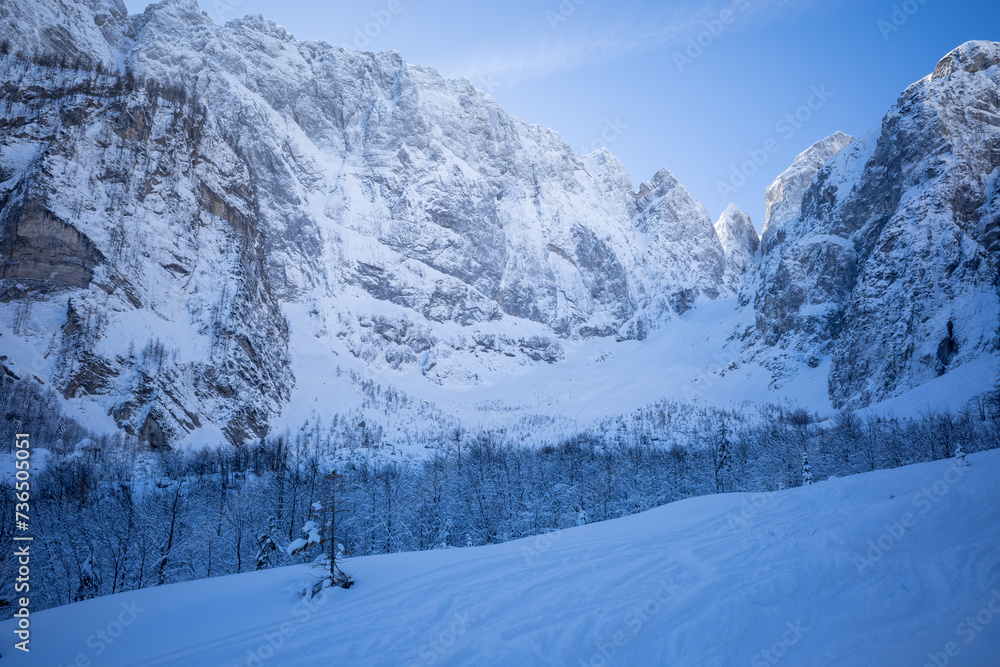 Panoramic view of the snow-laden Tamar Valley, shaded by alpine mountains during winter Panoramic view of the snow-laden Tamar Valley, shaded by alpine mountains during winter