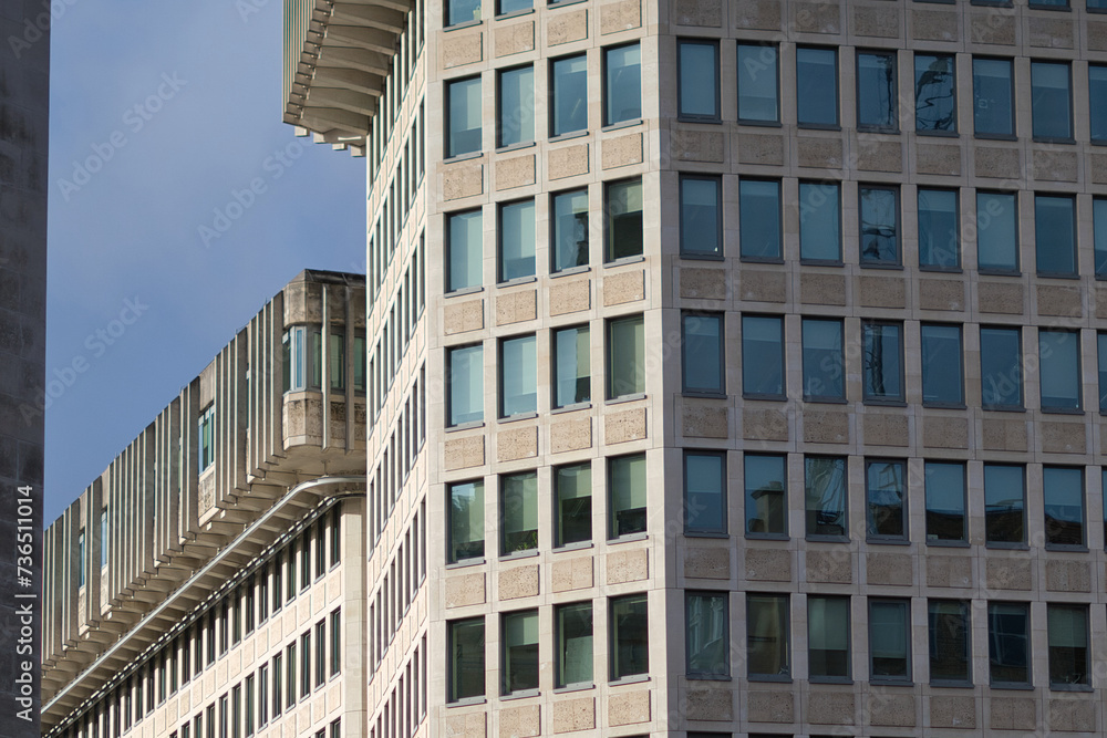 Fototapeta premium Facade of a modern building in a large city, featuring sleek architecture and contemporary design