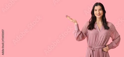 Beautiful young woman in st...