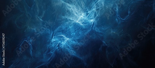 Blue fairy texture in hazy dark space. Abstract digital pattern for wallpaper, print, or background.