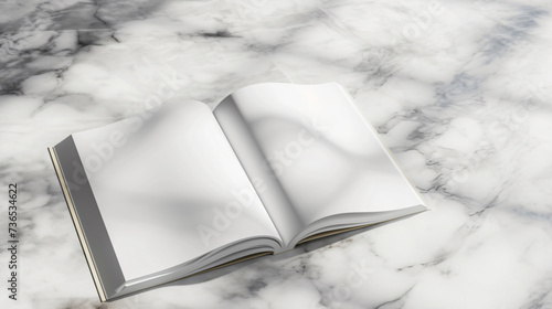 A visually striking stock image of a magazine mockup spread open on a sleek marble surface. The blank pages are elegantly positioned, casting soft shadows that add depth and dimension to the