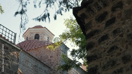 It is the dome of the historical Mevlevihane building in Antalya Kaleiçi. Cut stone and brick workmanship can be seen. The camera pans from below. photo