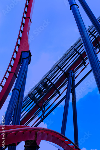 Rollercoaster railroad track over sky