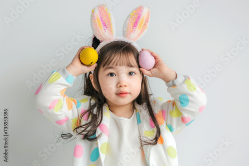 Happy child wearing Easter bunny ears