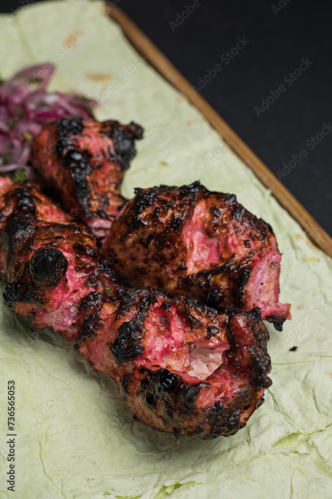 Obraz premium a delicious meat dish of Asian cuisine in a restaurant or pub. Close-ups