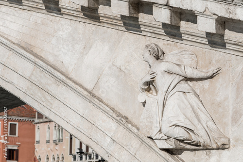Venice, Italy - February 13th, 2024: Details of the Rialto bridge in Venice during the carnival. Architecture of the historic center.