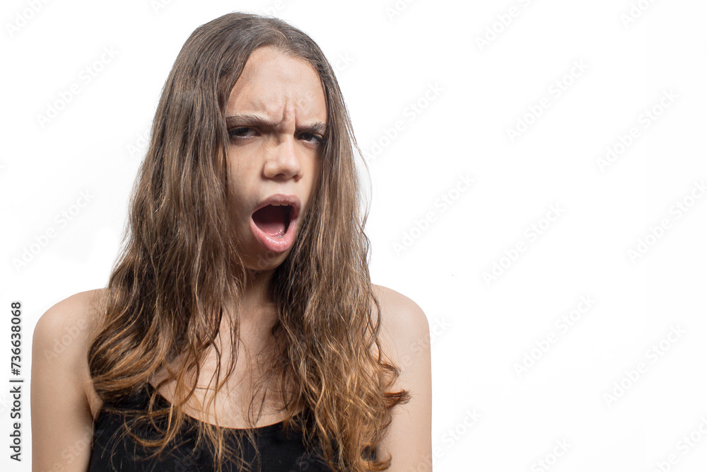 Portrait of a young blonde Latin American woman, upset expression of astonishment Portrait of a young blonde Latin American woman, upset expression of astonishment