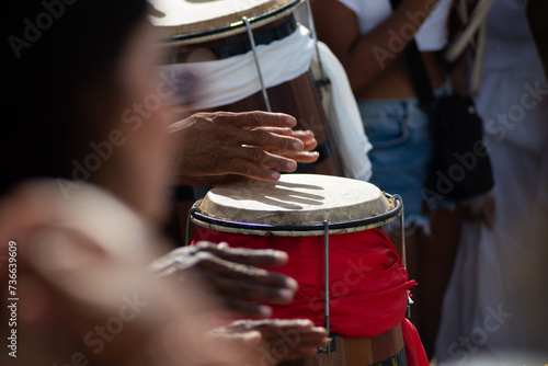 Musicians play percussion during a party for iemanja on Rio Vermelho beach. Salvador, Bahia. photo