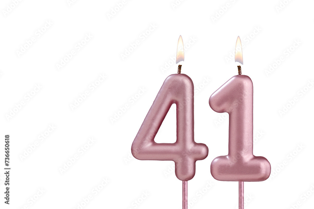 Lit birthday candle - Candle number 41 on white background Lit birthday candle - Candle number 41 on white background