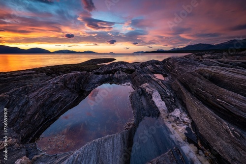 Rocky coast at Ullsfjord, evening mood, Lattervik, Lyngen, Troms og Finnmark, Norway, Europe photo