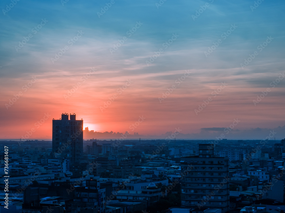 Sunset behind the buildings and city in Taiwan