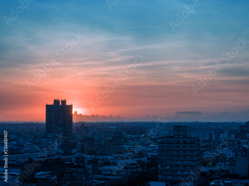 Sunset behind the buildings and city in Taiwan