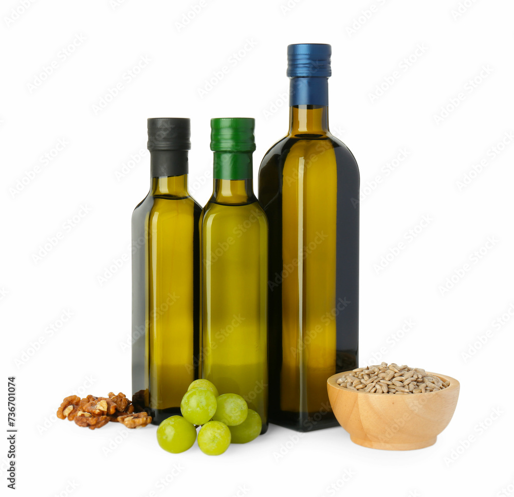 Vegetable fats. Bottles of different cooking oils and ingredients isolated on white Vegetable fats. Bottles of different cooking oils and ingredients isolated on white