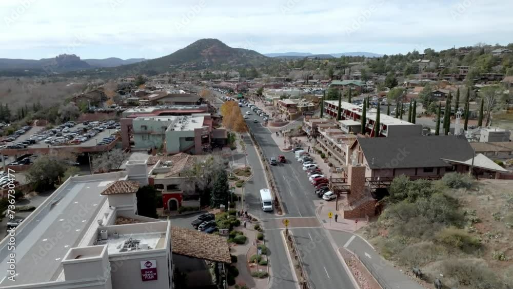 Downtown Sedona, Arizona with cars driving and drone video stable. Downtown Sedona, Arizona with cars driving and drone video stable.
